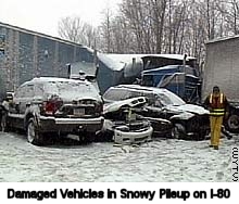 [Damaged Vehicles in Snowy Pileup on I-80]